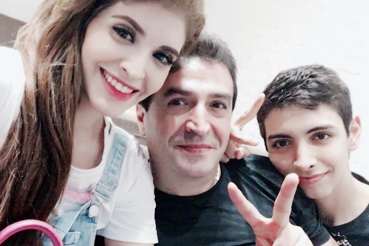 Rufino Aybar cùng bố và chị gái