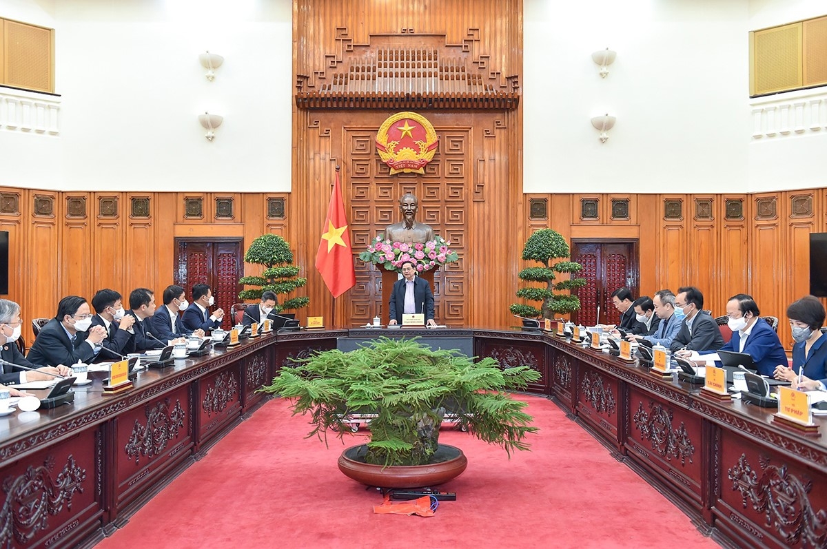 Thủ tướng Chính phủ Phạm Minh Chính trong một buổi làm việc với lãnh đạo ĐHQGHN