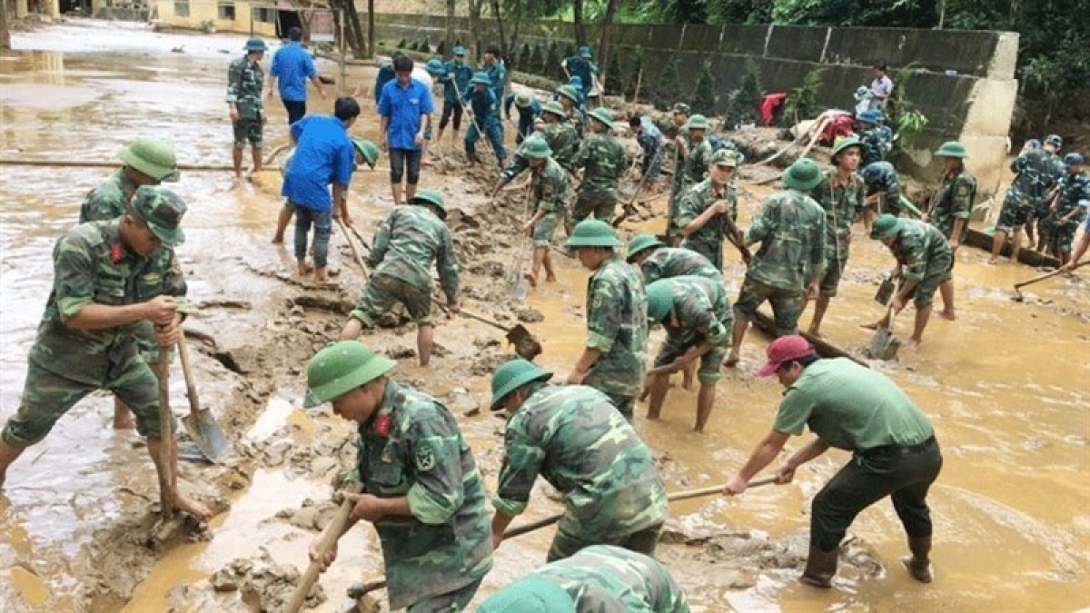 “Bộ đội cụ Hồ” luôn sát cánh cùng nhân dân, làm đúng chức năng của “đội quân chiến đấu, đội quân công tác, đội quân sản xuất”. Ảnh: qdnd.vn